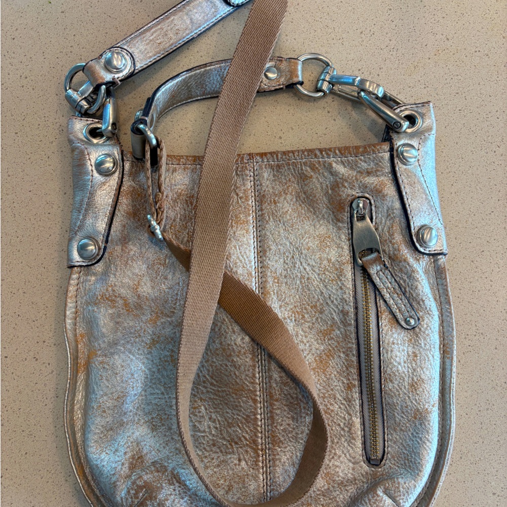 Super cool, metallic leather crossbody.